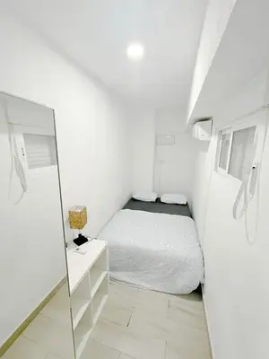 Cama o camas de una habitación en GZ20 Estudio Chamberi Madrid Centro AC WIFI