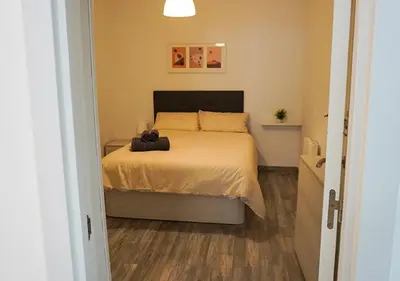 Cama o camas de una habitación en Apartamento 'Ronda de Toledo'