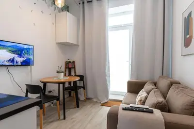 Una televisión o centro de entretenimiento en AR Lavapiés céntrico apartamento con patio
