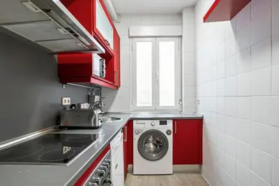 Una cocina o zona de cocina en Spacious modern flat in the centre of Madrid - Infantas