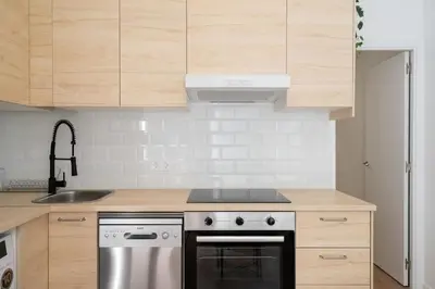 Una cocina o zona de cocina en Coqueto estudio en Madrid Río - HB