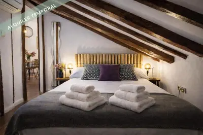 Cama o camas de una habitación en Ático en Plaza Mayor - AH