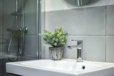 Un baño de Ático en Plaza Mayor - AH