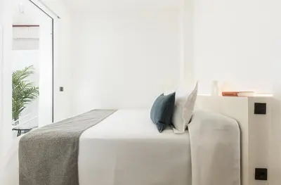 Cama o camas de una habitación en dPlace To Be - Apartamentos en Barrio de Salamanca