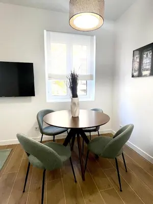 Una televisión o centro de entretenimiento en dPlace To Be - Apartamentos en Barrio de Salamanca
