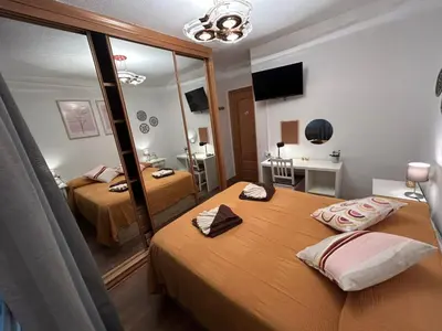 Cama o camas de una habitación en Rooms Pontones
