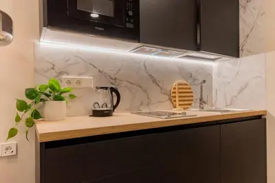 Una cocina o zona de cocina en For You Rentals Estudio Oriente Diseño y confort en DELICIAS MADRID Temporal PDD2916