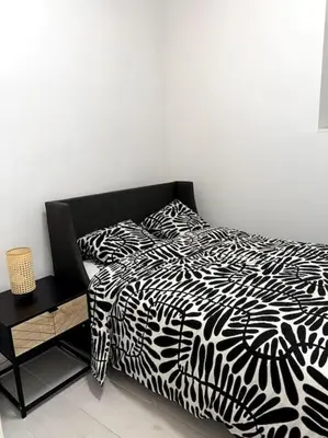 Cama o camas de una habitación en Coqueto piso a 3 min de Gran Vía
