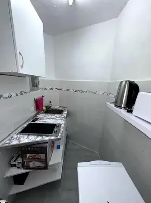Una cocina o zona de cocina en Coqueto piso a 3 min de Gran Vía