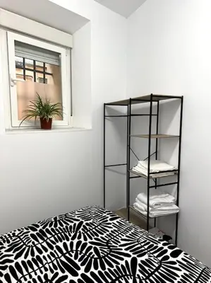 Cama o camas de una habitación en Coqueto piso a 3 min de Gran Vía
