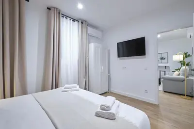 Cama o camas de una habitación en Lovely Apartments - Completo apartamento en excelente ubicación en Madrid