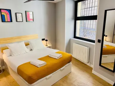 Cama o camas de una habitación en D1 Moderno apartamento en el centro de Madrid