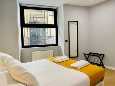 Cama o camas de una habitación en D1 Moderno apartamento en el centro de Madrid