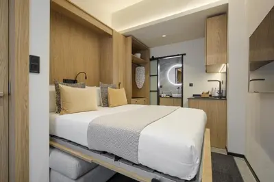 Cama o camas de una habitación en Dobo Madrid Palos