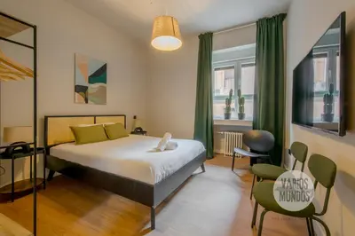 Cama o camas de una habitación en Escapada Chic para 12, conoce Toledo 77