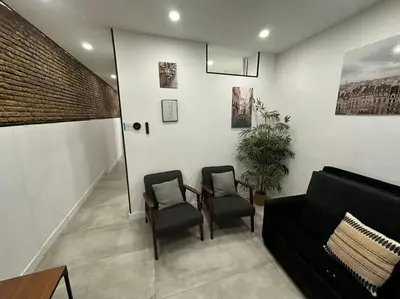 Zona de estar de Acogedor loft en Malasaña