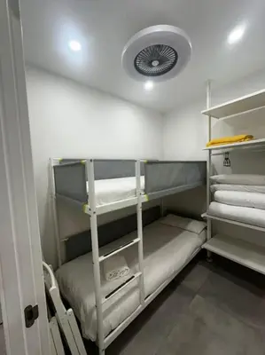 Cama o camas de una habitación en Acogedor loft en Malasaña