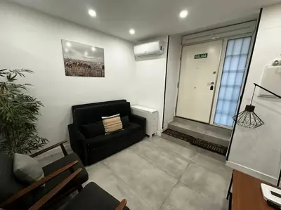 Zona de estar de Acogedor loft en Malasaña