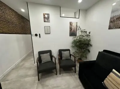 Zona de estar de Acogedor loft en Malasaña