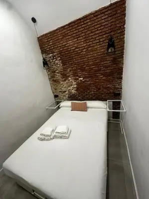 Cama o camas de una habitación en Acogedor loft en Malasaña