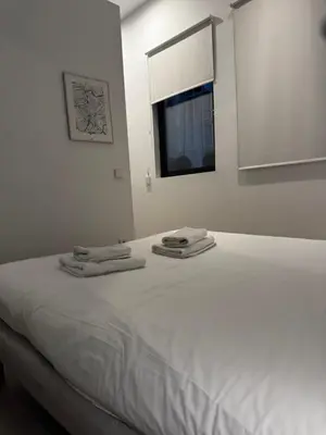 Cama o camas de una habitación en Exyca Barrio Salamanca