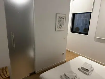 Cama o camas de una habitación en Exyca Barrio Salamanca
