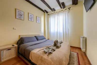Cama o camas de una habitación en Acogedor Apartamento en el Centro con Vistas