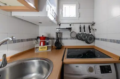 Una cocina o zona de cocina en Acogedor Apartamento en el Centro con Vistas