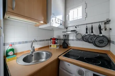 Una cocina o zona de cocina en Acogedor Apartamento en el Centro con Vistas