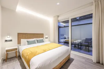 Cama o camas de una habitación en ATyCO Madrid