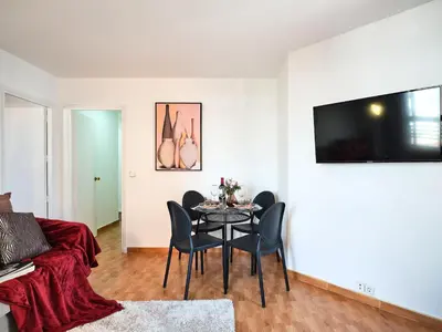 Una televisión o centro de entretenimiento en My City Home - Elegante apartamento en Chamberí