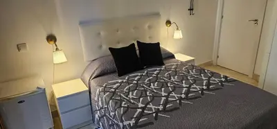 Cama o camas de una habitación en Habitaciones Chueca