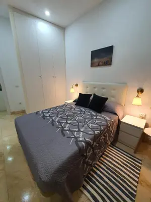 Cama o camas de una habitación en Habitaciones Chueca