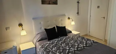 Cama o camas de una habitación en Habitaciones Chueca