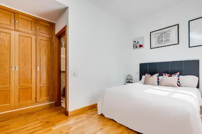 Cama o camas de una habitación en Arte y lujo en el corazón del Barrio de Salamanca