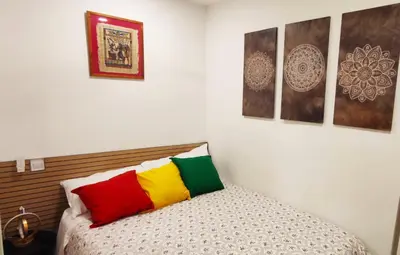 Cama o camas de una habitación en Corrala con estilo en Malasaña
