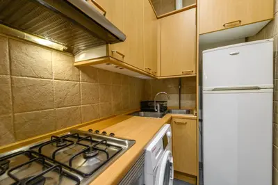 Una cocina o zona de cocina en Apartamento moderno y acogedor zona El Viso, Madrid