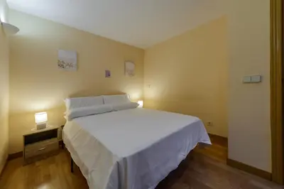 Cama o camas de una habitación en Apartamento moderno y acogedor zona El Viso, Madrid