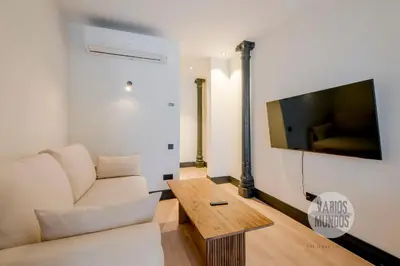 Una televisión o centro de entretenimiento en Diversión y confort para 10, ven a Duque de Rivas 8 E3