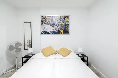 Cama o camas de una habitación en Apartamento Moderno y Céntrico en el Vibrante Lavapies