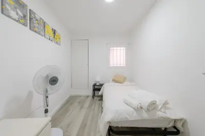 Cama o camas de una habitación en Apartamento Moderno y Céntrico en el Vibrante Lavapies