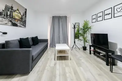 Una televisión o centro de entretenimiento en Apartamento Moderno y Céntrico en el Vibrante Lavapies