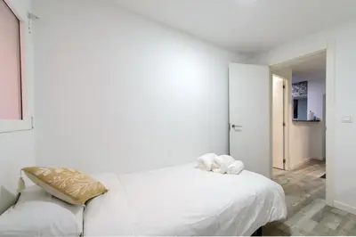 Cama o camas de una habitación en Apartamento Moderno y Céntrico en el Vibrante Lavapies