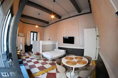 Una televisión o centro de entretenimiento en Wonderful Loft in Atocha