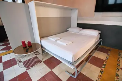 Cama o camas de una habitación en Wonderful Loft in Atocha