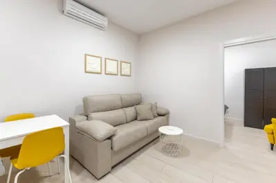 Zona de estar de Cuatro Caminos Apartment