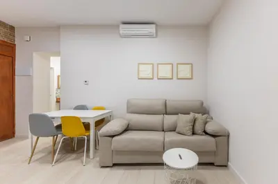 Zona de estar de Cuatro Caminos Apartment