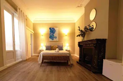 Cama o camas de una habitación en El Hostall