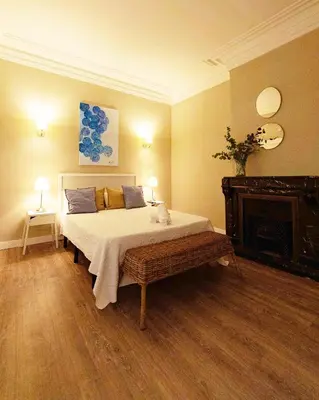 Cama o camas de una habitación en El Hostall
