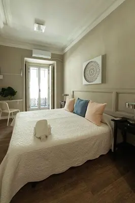 Cama o camas de una habitación en El Hostall